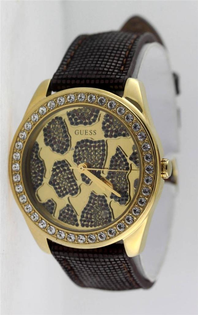 Guess W0056L2 Leopard Print Ladies Watch: Case size 40mm diameter, case thickness is 10mm, and band width is 18mm. Has an adjustable brown leather band.