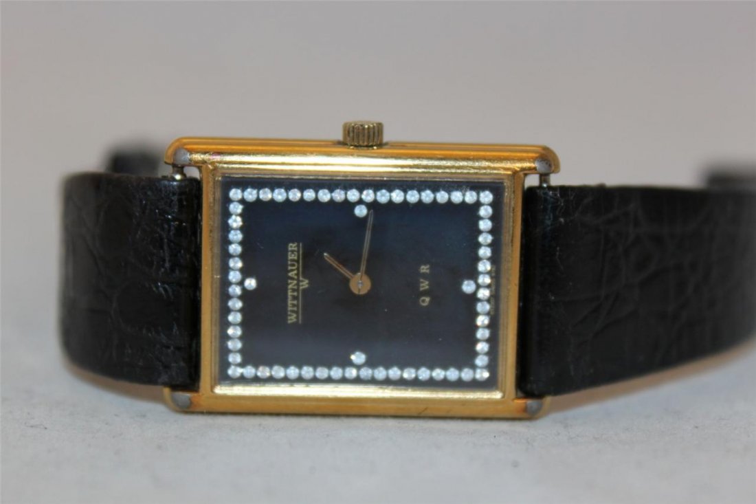 Wittnauer QWR Mens Watch Black Dial: Adjustable Black Leather Band Gold Plated Case Black Dial with Stones