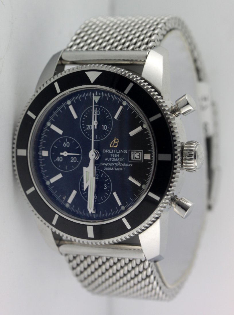 Breitling A13320 SuperOcean Heritage Chronograph Men's: Wrist size 7.5" Case diameter 46mm Black dial Stainless steel case and mesh band Rotating bezel