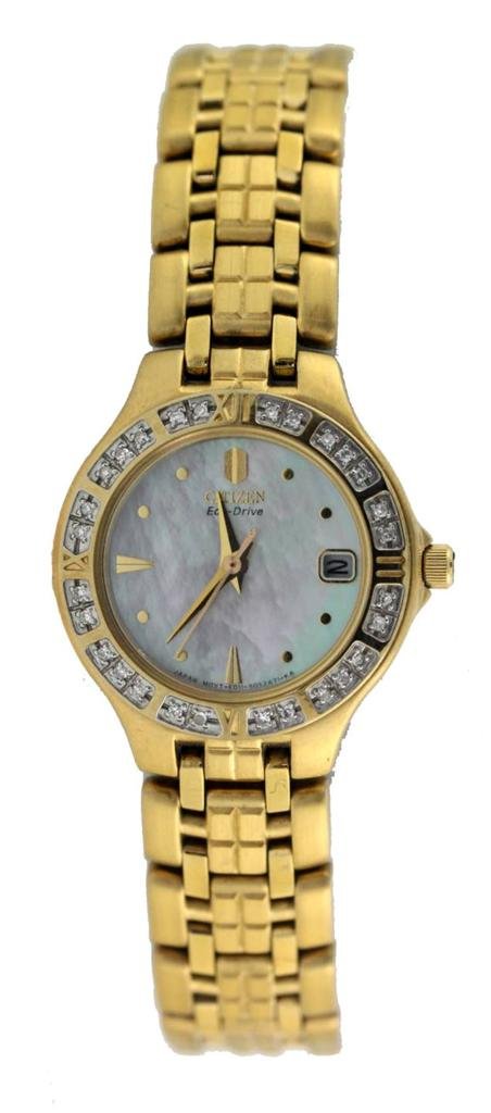 Citizen EcoDrive Gold Tone Mother Of Pearl Dial Diamond: The wrist size measures 7". Petite ladis watch with a mother of pearl dial and a 29 stone diamond bezel.