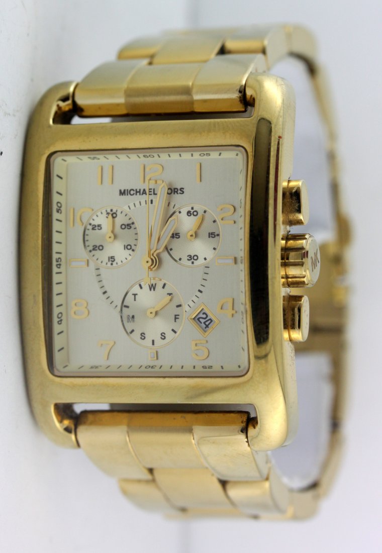 Michael Kors MK5436 Chronograph Gold Tone Stainless: 36mm case diameter 7.25" wrist size Gold tone case and band Deployment buckle on band Quartz movement