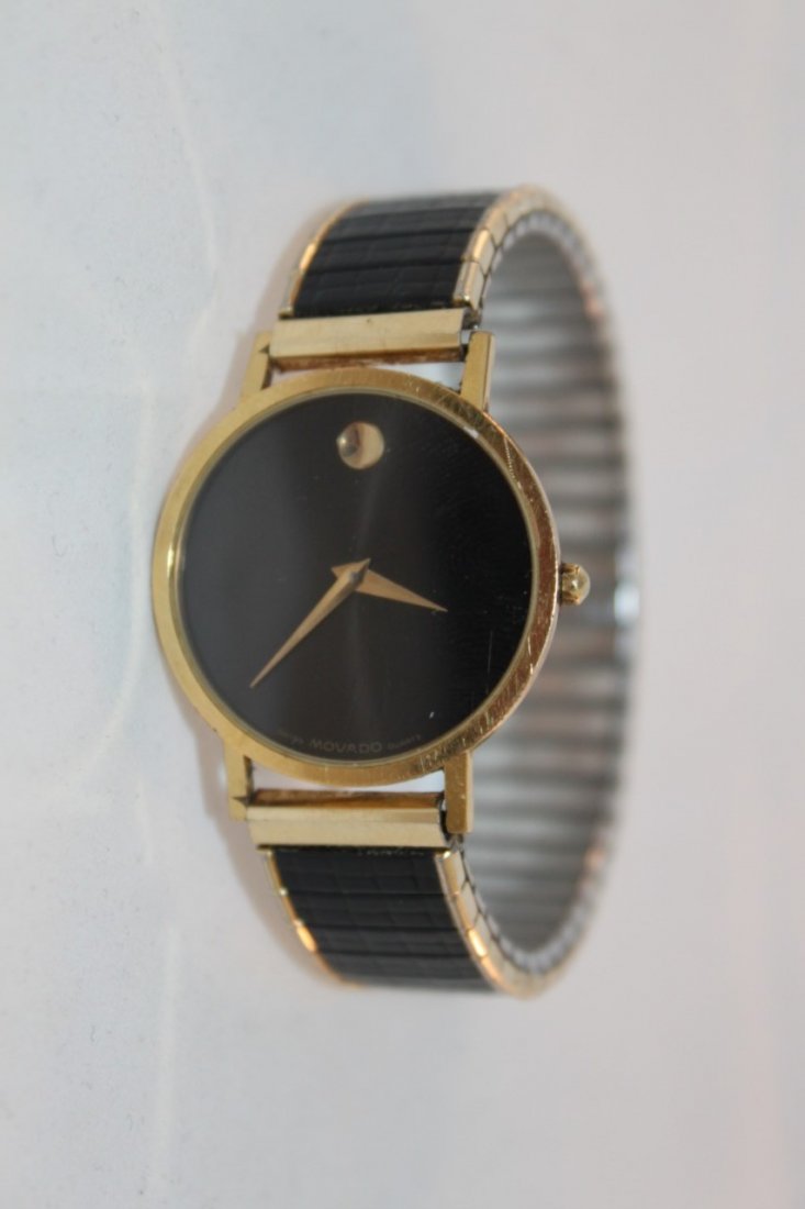 Movado Watch 87 33 882 Vintage Gold Museum Quartz Men's: Standard men's stretch band Museum dial Stainless steel Not working FOR PARTS OR REPAIR