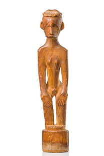 Standing female figure "binulul", around 1910/20 -: wood, matt reddish brown patina, characteristic headform with short "cut" chin, carved with cylindrical base (with traces of humidity/possibly used as stopper), slightly dam., minor missing parts,