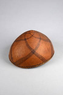 Helmet-shaped headdress - Indonesia - Borneo, Dayak: extremely fine plant fibre netting, dyed in brown, orchid bast, black dyed fibres forming patterns, the inside entirely lined with fine rotan strips (partly wrapped with wool), additional: separate