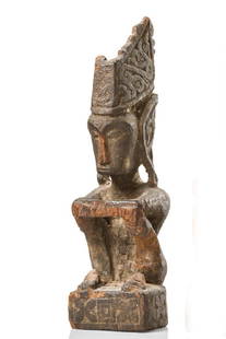 Seated ancestor figure "iene" - Indonesia - Moluccas -: wood, dark brown patina, strongly encrusted in parts, typical seated posture, wing-shaped headdress, slightly dam. (arms), missing parts (both shanks/headdress).Figures "iene" were carved shortly