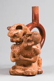 Man with feline stirrup vessel, c. 450 - 550 AD - Peru, Moche