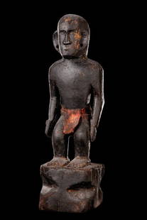 Rice deity "bulul" - Philippines - Ifugao: wood, black encrusted patina, loincloth, large ears with drilled holes for ornament, min. dam., cracks, small missing parts, slight signs of abrasion;the "bulul" rice gods should guarantee a good