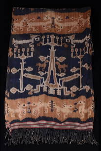 Ikat - Indonesia: cotton, two cloth width, four narrow stripes with red ground in change with three broad stripes in blue colour, each decorated with stilized animals, fringes on either end, faded colours on one