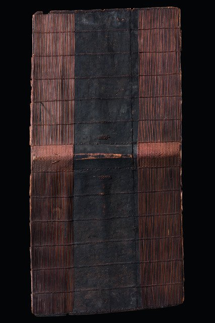 Shield - D. R. Congo, Tofoke: wood, rattan, rectangular, roof-shaped, a wide horizontal brace, the back of the shield is covered with split bamboo-like reeds tightly bound together, decorated with wickerwork, min. dam., slight tra