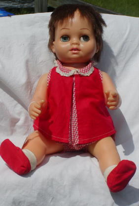 15" Tiny Chatty Baby, Mattel, All Original: Vintage 1960s Tiny Chatty Baby by Mattel, dressed in original red gingham two piece outfit with one piece socks and shoes. Blue sleep eyes, brown hair in pixie cut, uneven, minor sparse spot top of he