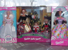 Three Barbie Dolls, Gift Set: Three Barbie dolls including 1998 Holiday Sisters Gift Set, plus Sweet Magnolia Barbie, and Country Bride. All unopened in original box, boxes may show minor wear.