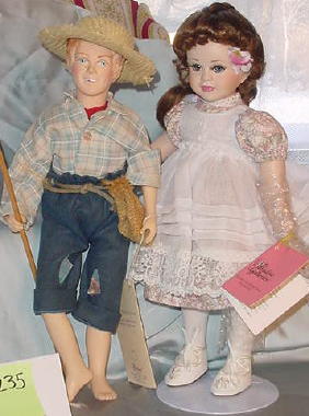 Effanbee Huck Finn Character, Melissa: Two dolls including 13" Effanbee Huck Finn, wrist tag dated 1983 from the Mark Twain Collection; and 12" bisque head Melissa with Certificate by Paradise Galleries, both excellent condition.