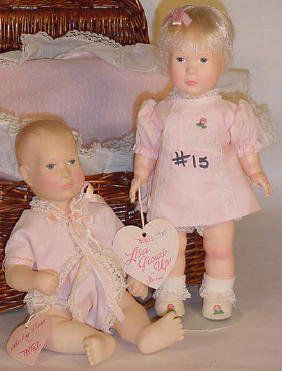 Baby Lisa and Lisa Toddler, by Astry Campbell: Two Effanbee dolls" 10" Baby Lisa in Basket, and 11" Lisa Grows Up, designed by NIADA artist Astry Campbell, 1981 and 1983, respectively. Wrist tags, unplayed with condition, some minor discoloration