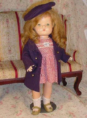 16" Effanbee Patsy Joan: 16" vintage jointed composition Effanbee Patsy Joan wth dark blonde human hair wig, green sleep eyes with real lashes (sparse), redressed, shoes appear original; doll originally had molded hair - wig