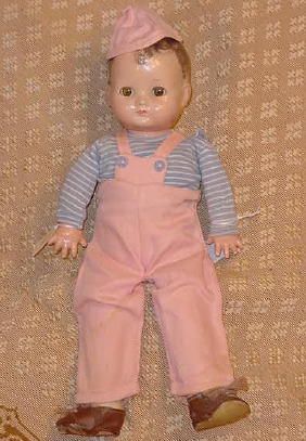 14" Effanbee Boy Doll, Original Outfit: 14" Effanbee molded hair boy with clear brown sleep eyes, all lashes in place, original corduroy outfit with matching cap, brown lace shoes some wear and damage to soles. Marked Effanbee on head - clo