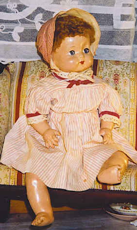 81_19" Effanbee Character, Sweetie Pie: 19" 1930s Effanbee Character baby Sweetie Pie with caracul wig, blue flirty sleep eyes, composition head, arms and legs, cloth body, redressed, faint crazing, split in composition near left eye, typic