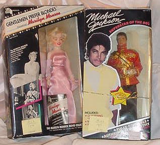 163_4 Portrait Celebrity Dolls: Four boxed celebrity portrait dolls including (boxes may show minor wear), George Burns by Effanbee from the Legend Series, 1996; Michael Jackson, Superstar of the 80's in American Music Awards Outfit