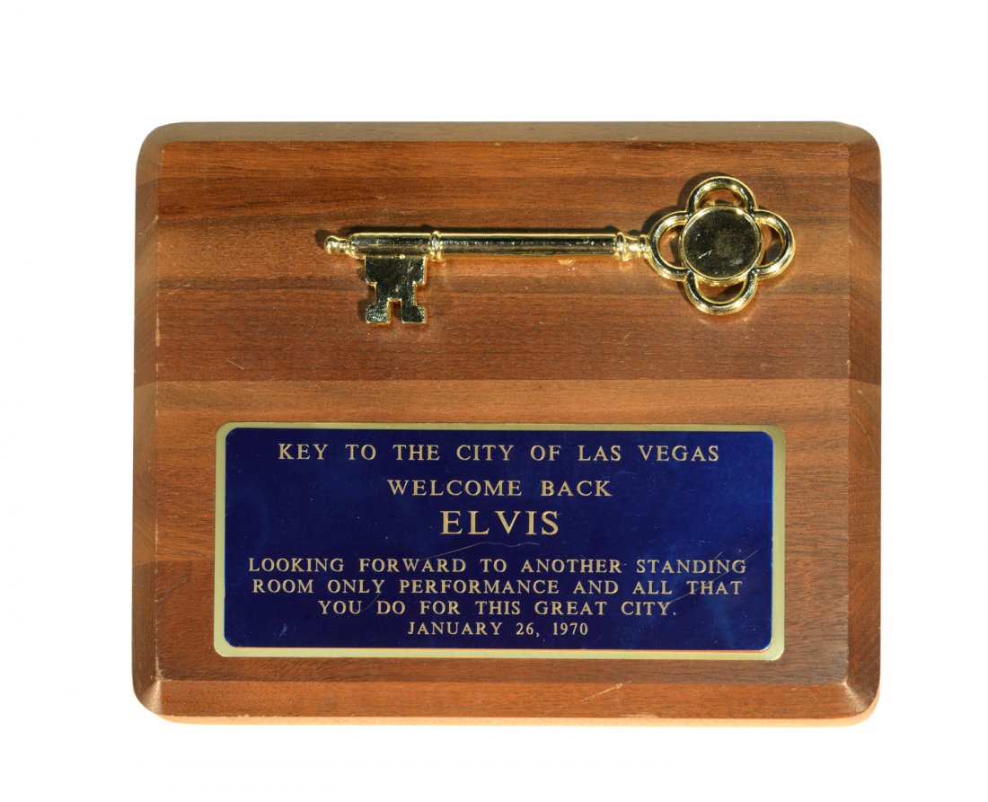 Presentation Key to the City of Las Vegas: From the Collection of Greg Page. Presented to Elvis on January 26, 1970, this honorary key to the City of Las Vegas is mounted as a presentation plaque measuring approximately 7 1/2 by 9 1/16 inches 