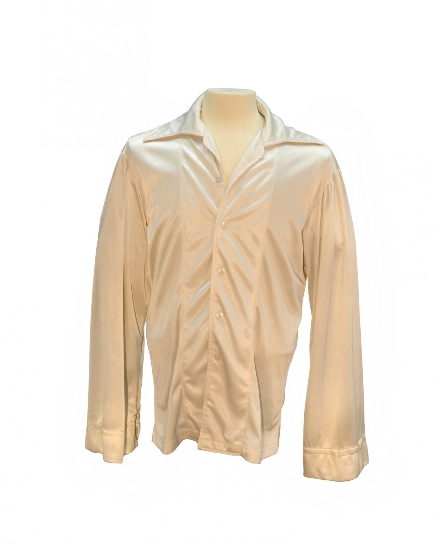 White “Puffy Sleeve” Shirt, 1970s: From the Collection of Greg Page. Made for Elvis by the IC Costume Company, this shirt, with puffy sleeves and cuffs that were a particular favorite of Elvis' during the 1970s, was obtained directly f