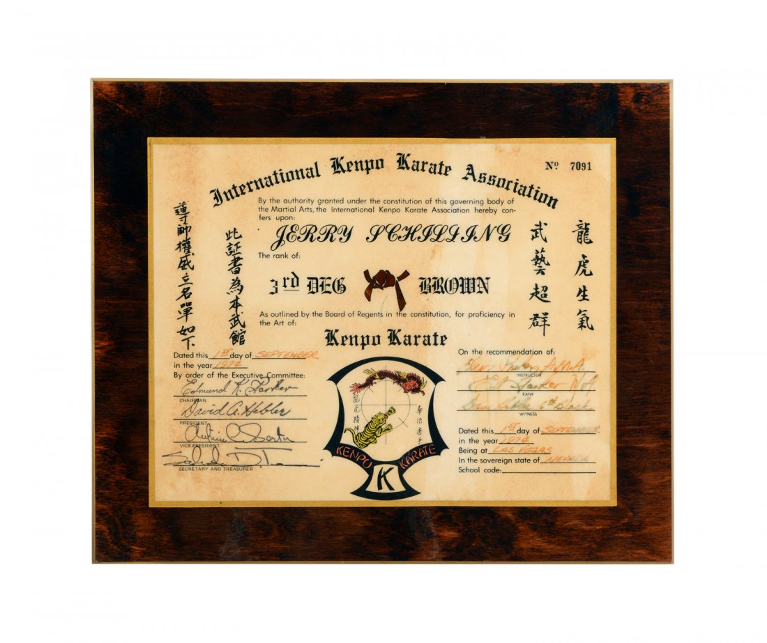 Karate Plaque Belonging to Jerry Schilling: From the Collection of Greg Page. This certificate signed by Elvis as Jerry Schilling's karate instructor is dated 1st September 1974 and is mounted as a plaque. Accompanied by a letter of authenticit