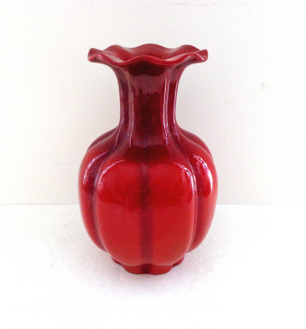 Zsolnay Hungary Flambe Vas: This lobed vase has a flared rim and wonderful flambe glaze.The glaze is darker in the recesses which helps give it definition.Excellent condition.It has a shallow foot.The Zsolnay mark is on the base