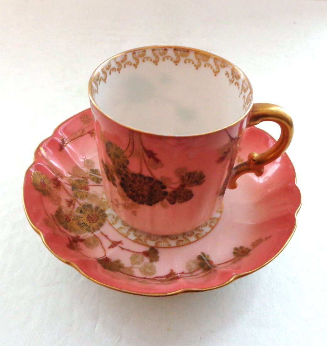Antique Haviland Limoges Dainty Cup and Saucer: Eggshell porcelain - thin enough to see through. The saucer is deep at 7/8"and is 4 1/4" in diameter. The cup stands 2 1/4" high and is 2 3/16" in diameter. The color ranges from a beautiful lipstick 