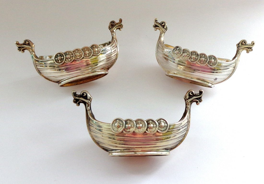 3 Viking Ship Open Salts Sterling Norway and Sweden: This lot is for 3 silver classic Viking Ship open salts.Two have glass liners. One is marked for Norway 925 Theodore Olsens sterling silver, one is marked for Sweden 830 silver, and last one (the only