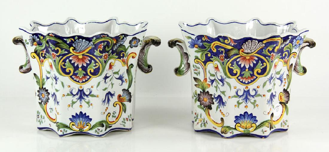 Pair of Faience Desvres Jardinieres: Pair of French Desvres faience Fourmaintraux jardiniere planters, porcelain, 8" high x 9 1/2" diameter. Provenance: from the lifetime collection of Cheryl Burke of Sarasota, Florida.