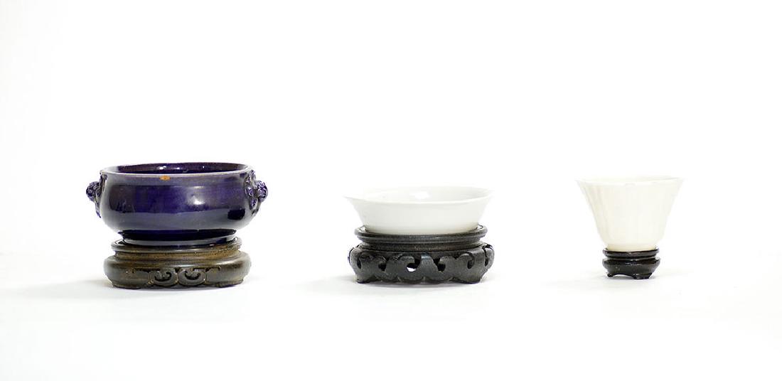 Group of 17th C. Chinese Monochrome Ceramics: Group of Chinese monochrome ceramics, 17th century, to include: a rich aubergine glazed censer, unmarked, late Ming dynasty; a creamy white glazed brush washer, mark of Chenghua, late Ming Dynasty; an