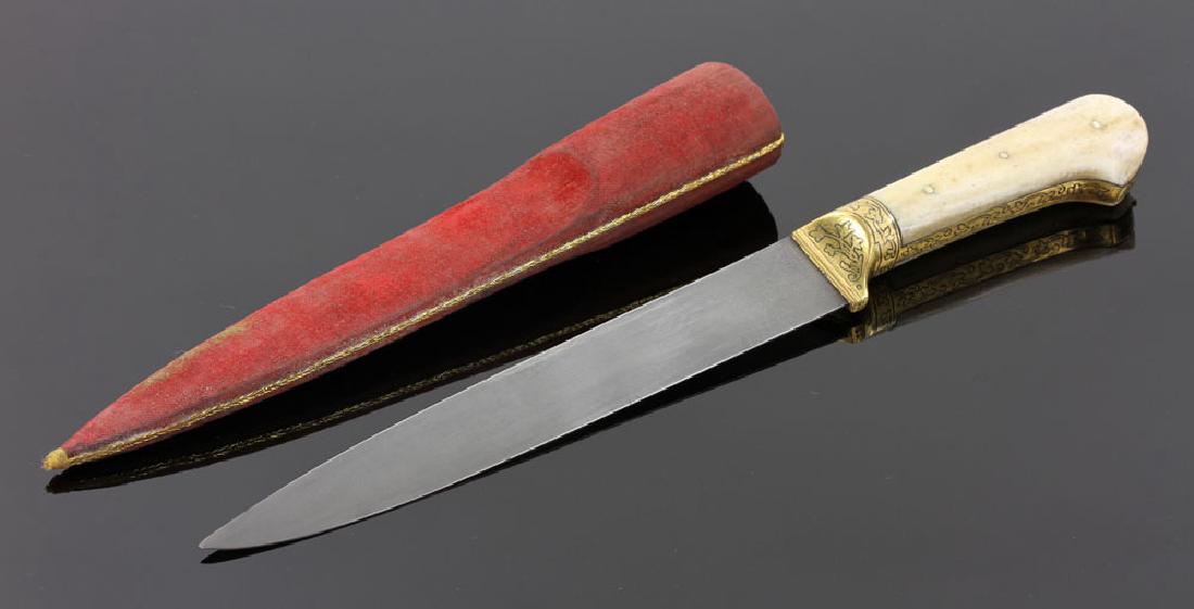 Mughal Dagger with Bone and Inlaid Gilt Handle: Mughal dagger, bone and inlaid gilt handle, later sheath, 11 1/4" l, 7" l (blade only). Provenance: From a Houston, Texas collection.
