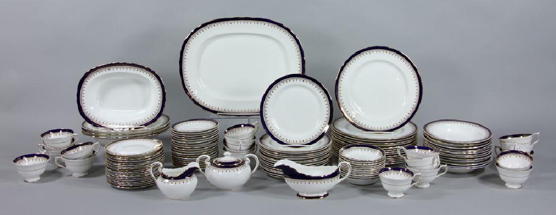 Set of Aynsley China Serving Set, 118 Pieces: Set of Aynsley china serving set, 118 pieces, Leighton pattern with cobalt trim, to include: 1 large serving platter, 4 vegetable bowls, 1 gravy boat, 14 dinner plates, 19 bread and butter plates, 13 