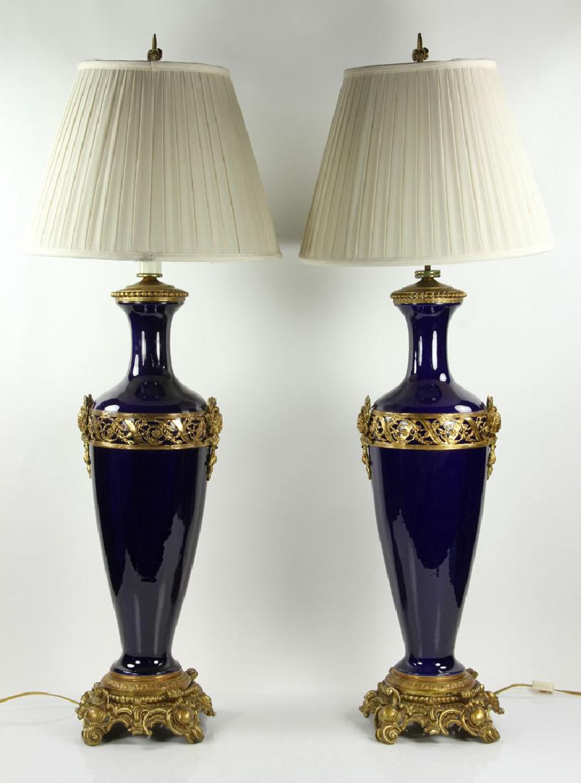 Pr. French Ormolu and Cobalt Lamps: Pair of extra large French cobalt blue lamps, with ormolu mounts, 41" h x 18" dia. Provenance: From the lifetime collection of Cheryl Burke of Sarasota, Florida.