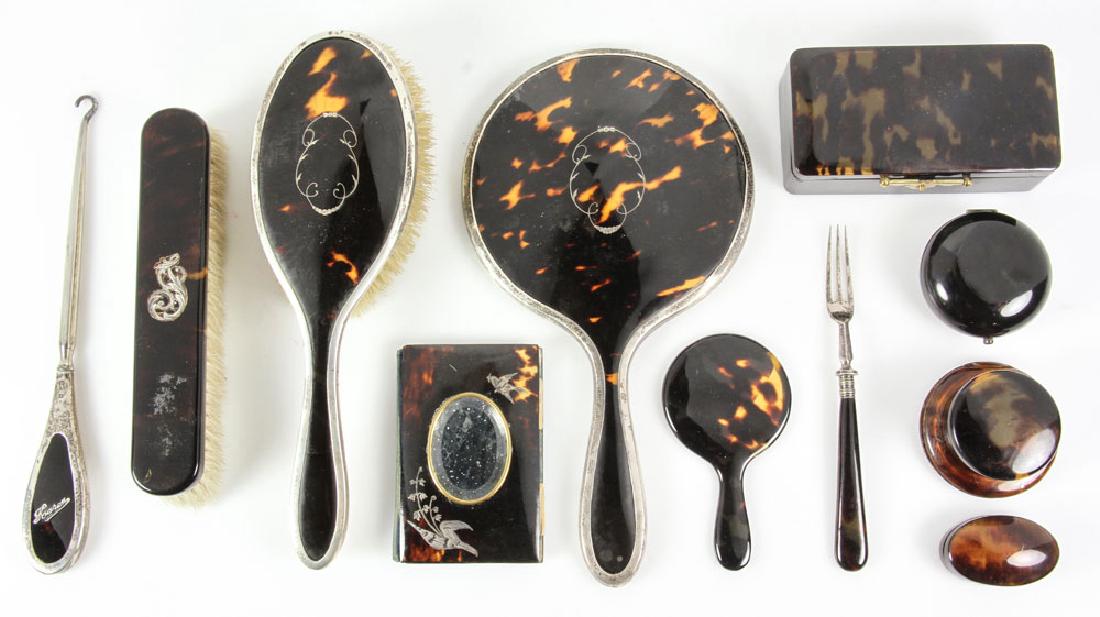 Miscellaneous Collection of Antique Tortoise Shell: Miscellaneous collection of antique tortoise shell, to include: brushes, mirrors, compact, notepad, etc. Brush, mirror, boot hook have sterling frames, hallmarked for London, notepad and brush have st