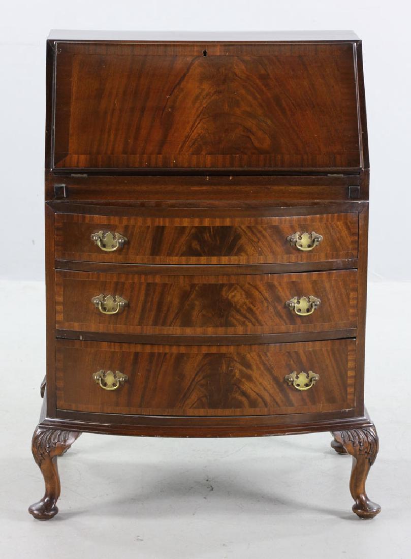 Chippendale-Style Writing Desk: Chippendale-style fall slant top desk, bow front design with three drawers, brass pulls, circa late 19th-early 20th century, 38" high x 29" wide x 20" deep. Provenance: from a Concord, Massachusetts e