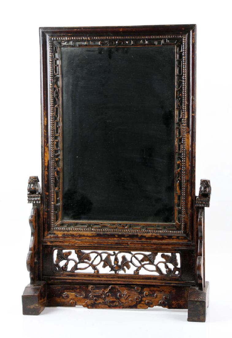 Chinese Mirror on Stand: Chinese mirror on stand, natural wood, from Shanxi Province, 10" h x 19" w x 8" d. Provenance: From the personal collection of Cheryl Burke, of Sarasota, Florida.