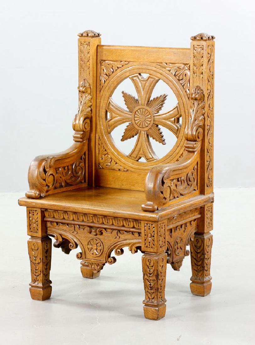 Natural Oak Armchair: Late 19th century armchair, natural oak with carved cross, 43" high x 26 1/2" wide x 22 1/2" deep. Provenance: from the Holy Family Catholic Church of South Boston, Massachusetts, thence from a privat