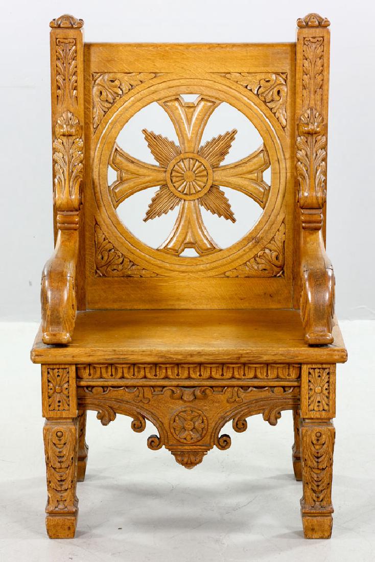Natural Oak Armchair: Late 19th century armchair, natural oak with carved cross, 43" high x 26 1/2" wide x 22 1/2" deep. Provenance: from the Holy Family Catholic Church of South Boston, Massachusetts, thence from a privat