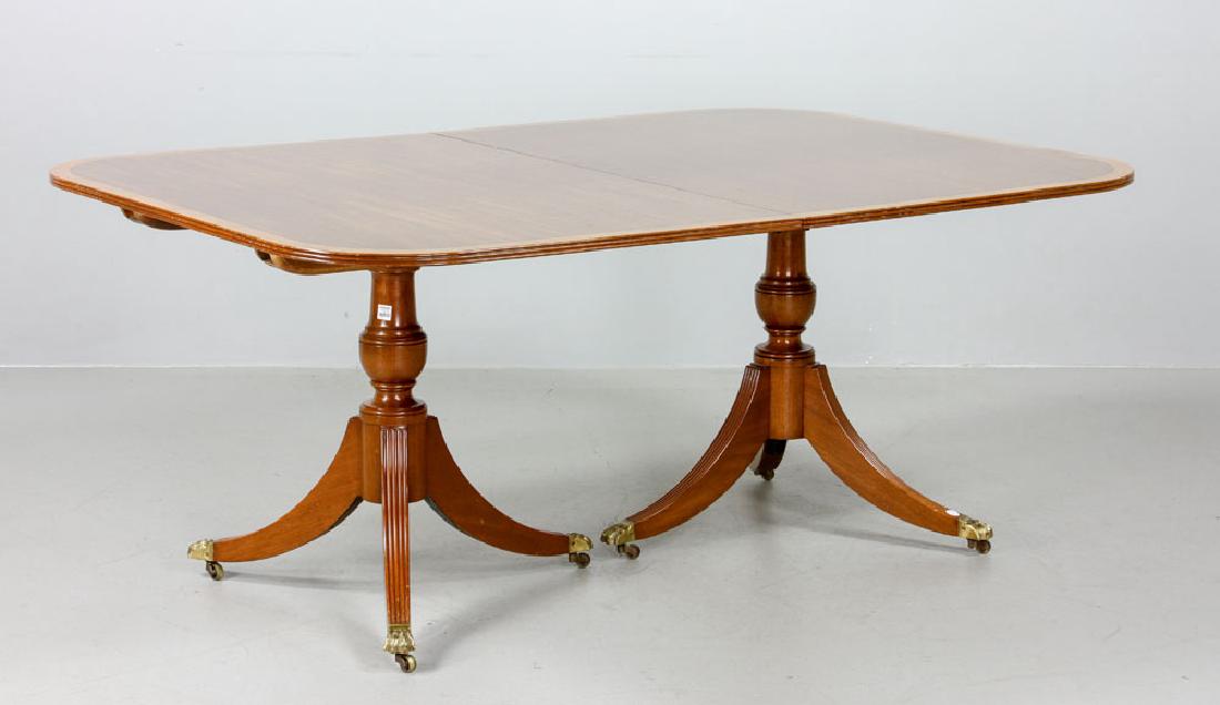 Mahogany Pedestal Dining Table: Pedestal dining table, mahogany, with three leaves, 29 1/2" high x 69" wide x 47" deep (table), leaves each 18" wide. Provenance: from a Maine estate.