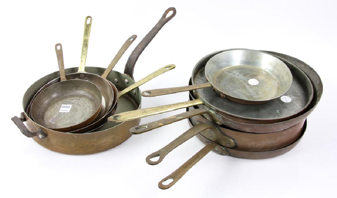 Lot of Assorted Copper Cookware: Lot of assorted copper cookware, including crepe and frying pans, stamped "Waldow - Brooklyn, N.Y.," "Coppal - Portugal," "Country Kitchen," "Paul Revere - signed - 1776-1976," largest measuring 20 1/