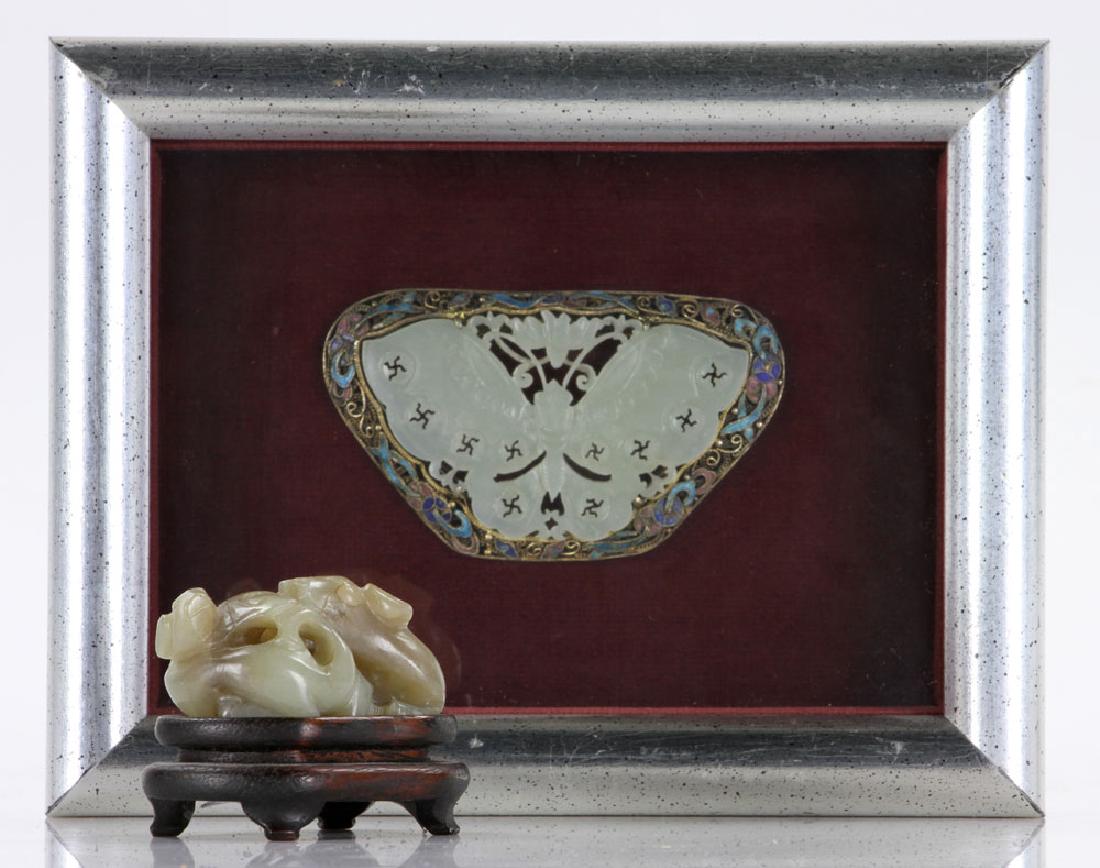 Two Chinese Carved Jade Animals: Two Chinese carved animals, jade, to include butterfly with enameled silver trim in shadow box, and carved ox on stand, 5 1/2" high x 7" wide (butterfly frame). Provenance: from a Massachusetts collec