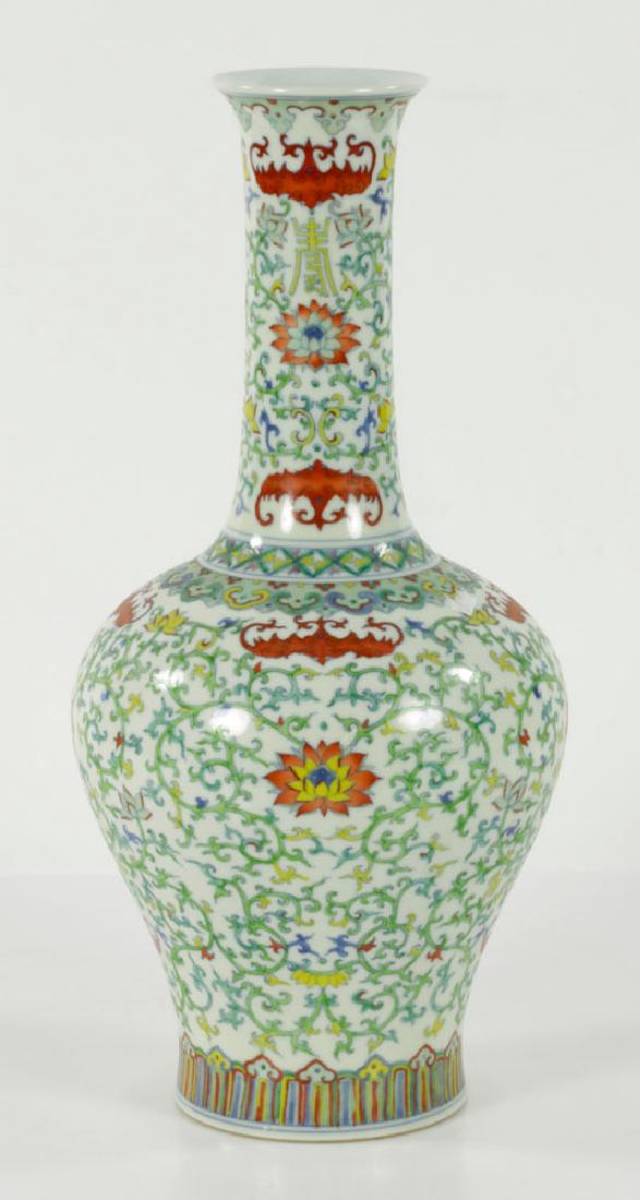 Chinese Famille Rose Porcelain Vase: Chinese famille rose porcelain vase, with flower design and Qianlong marks, 15 1/2" h. Provenance: From a Belle Mead, New Jersey estate.