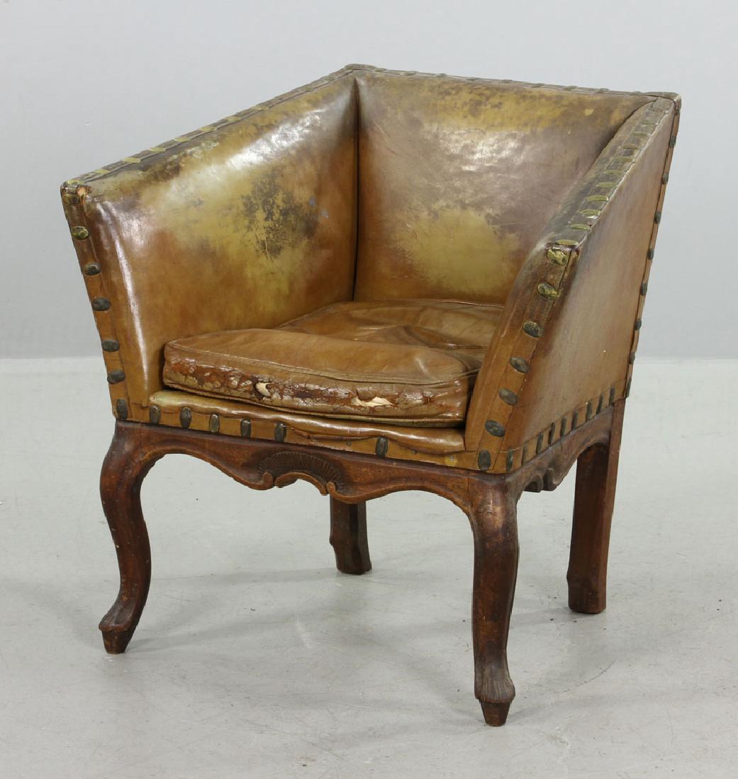 Continental Leather Armchair: Continental armchair, leather, 30" high x 30" wide x 24" deep. Provenance: from the estate of Jonathan Orr Swan, former professor at the Museum of Fine Arts School in Boston, thence by descent from a 