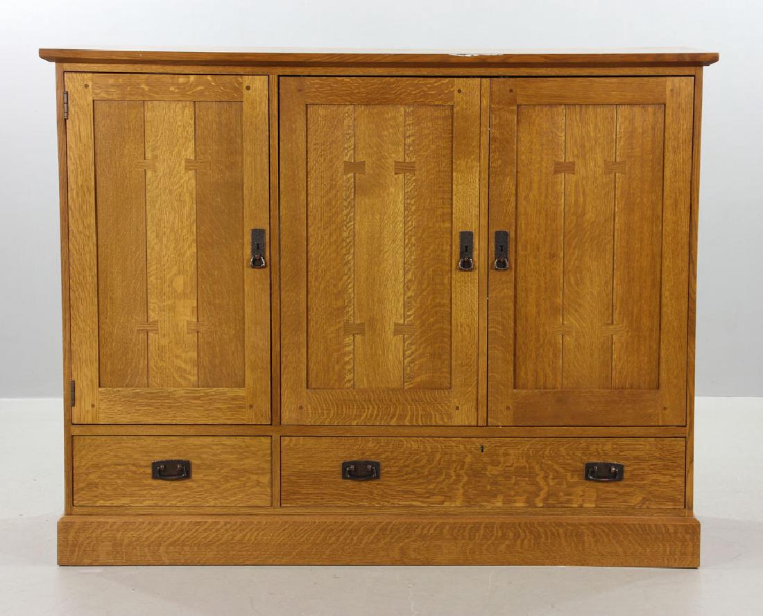 Stickley Quarter Sawn Oak Cabinet: Stickley quarter sawn oak cabinet, one two-door cupboard and one single door cupboard above two drawers, 49" h x 62 1/2" w x 23" d. Provenance: From a Sherborn, Massachusetts estate.