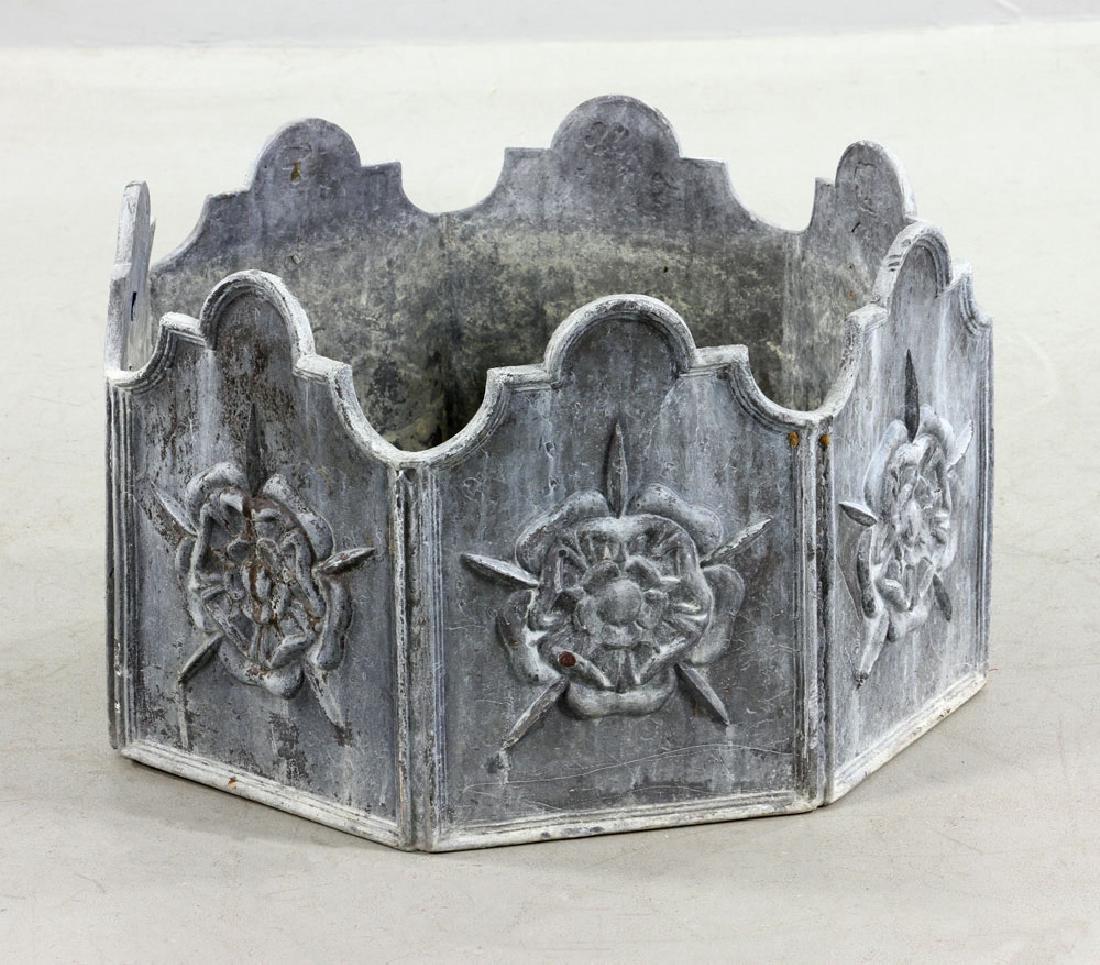 Antique Style Lead Planter: Antique style planter, lead, exterior decorated with Tudor Rose motif, 15" high x 25" diameter. Provenance: from a Boston, Massachusetts estate.