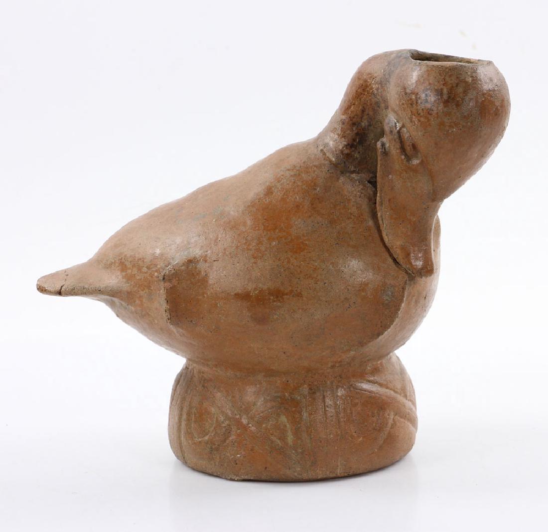 Pre-Columbian Duck Vessel: Pre-Columbian duck vessel, pottery with rust colored glaze, 7 3/4" high x 9" wide. Provenance: from the collection of David Stuart of David Stuart Galleries, Los Angeles, California.