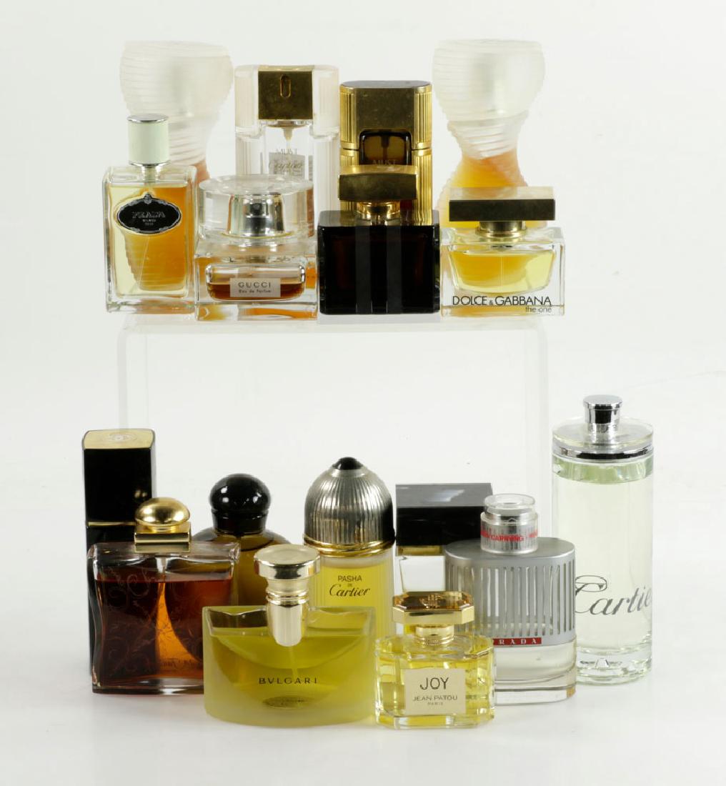 Box Lot of Designer Perfume: Box lot of designer perfume from brands including Dolce & Gabana, Prada, Gucci, Bvlgari and Hermes, 17 bottles in total.