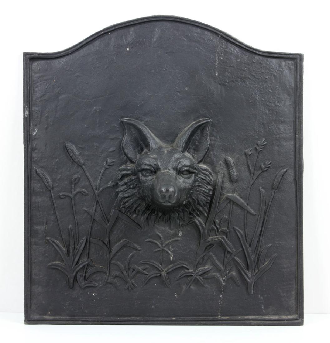 Cast Iron Fire Back with Fox Motif: Cast iron fire back, with fox motif, 25" h x 22 3/4" w.