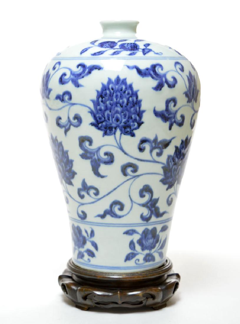 Very Fine Blue & White Vase: Very fine blue and white vase, 8 1/4"h. The body is decorated in rich underglaze blue with a broad band of leafy floral scroll bearing large flowers and buds between a narrow band of flower sprigs abo