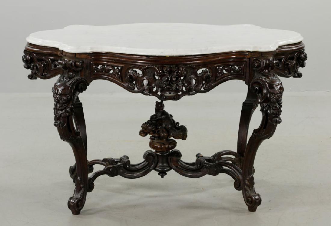 19th C. Carved Walnut Marble-Top Squirrel Table: 19th C. carved walnut Victorian marble-top table with carved roses, carved heads on the legs, large carved squirrel on cross stretcher, 28 1/2"h. x 46 1/2"l. x 30"d.
