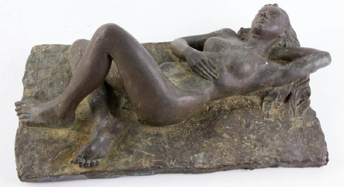 Bronze Sculpture of Reclining Woman: Bronze sculpture of a reclining woman incised 'GI' and '85', 14" x 7 3/4".